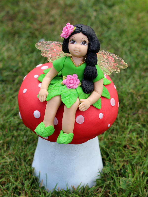 Fairy-cake-topper-with-toadstool-and-flowers