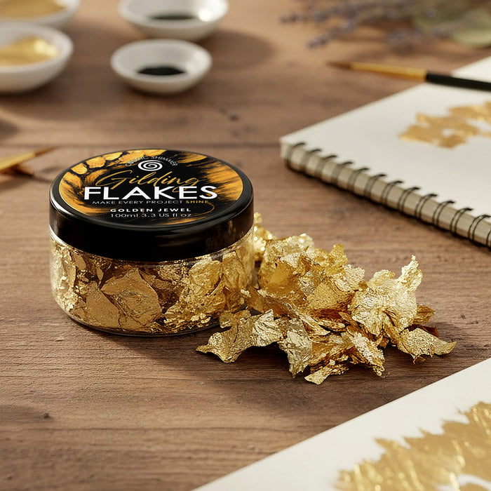 Close up of Golden Jewel gilding flakes with metallic texture and shine