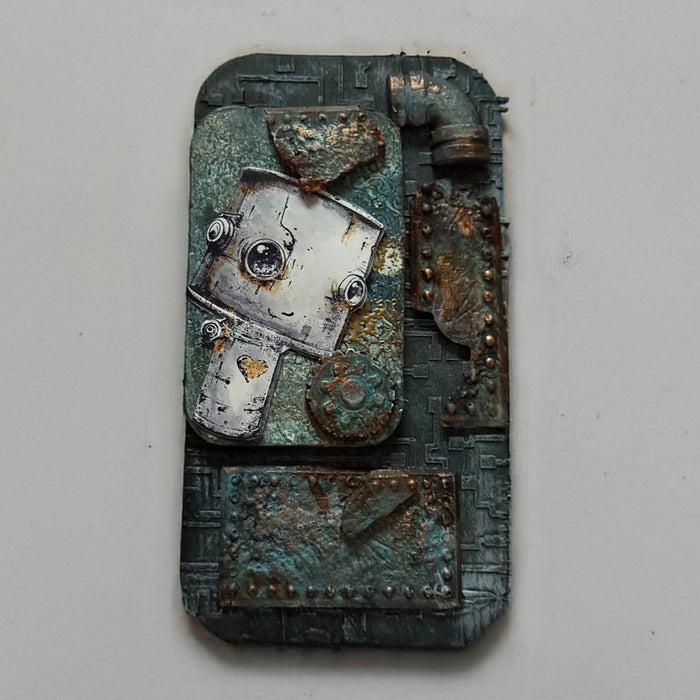 A decorative piece of art with a textured background in grey and a robot.