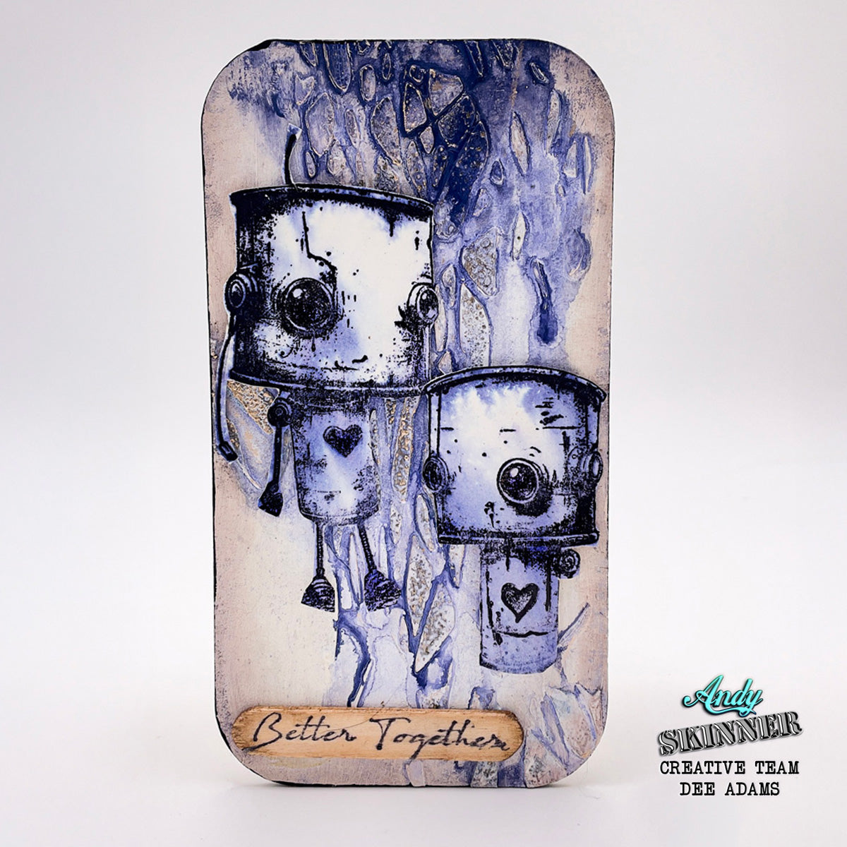 A piece of card with robot design and 'Better Together' text on a white background