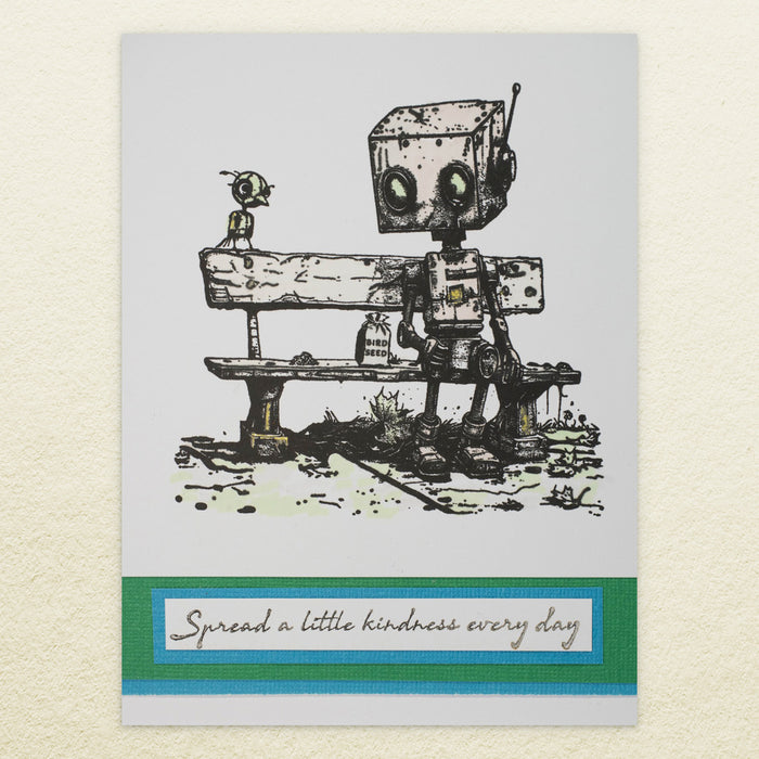 Stamp of a robot and a bird on a bench with a message saying 'Spread a little kindness every day'.