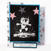 Card with the robot stamp and stars design on a black background and the words 'When life throws you a rainy day... splash in a puddle!' on the bottom.