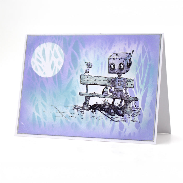 Greeting card with a robot and bird on a bench against a purple and blue watercolor background.