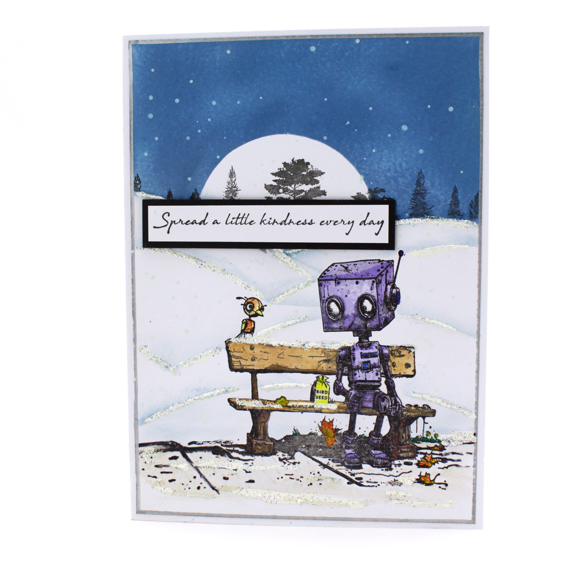 Card with a robot and bird on a bench under a moonlit sky, featuring the text 'Spread a little kindness every day'.