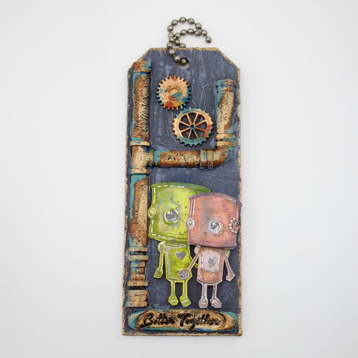 Decorative tag with two cartoon robots, pipes and gears on a white background