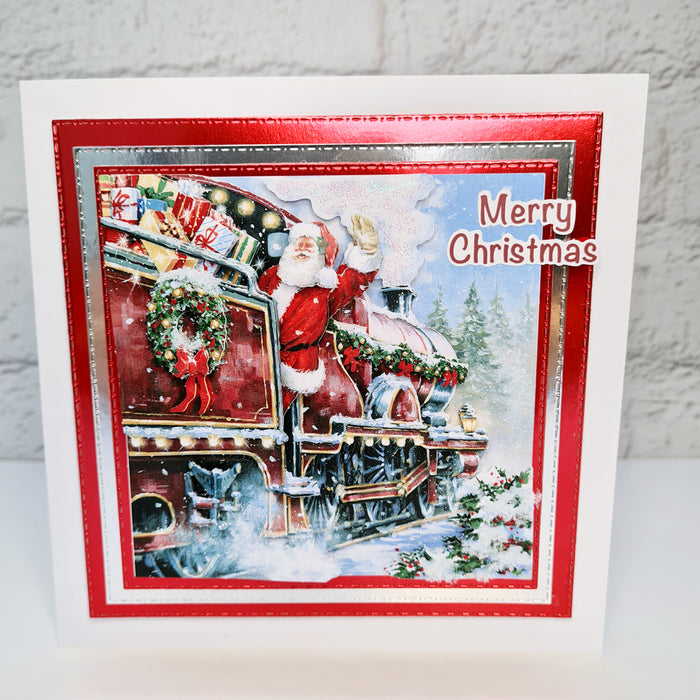 Gestanztes Decoupage – Weihnachtsmann im Zug (3er-Pack)